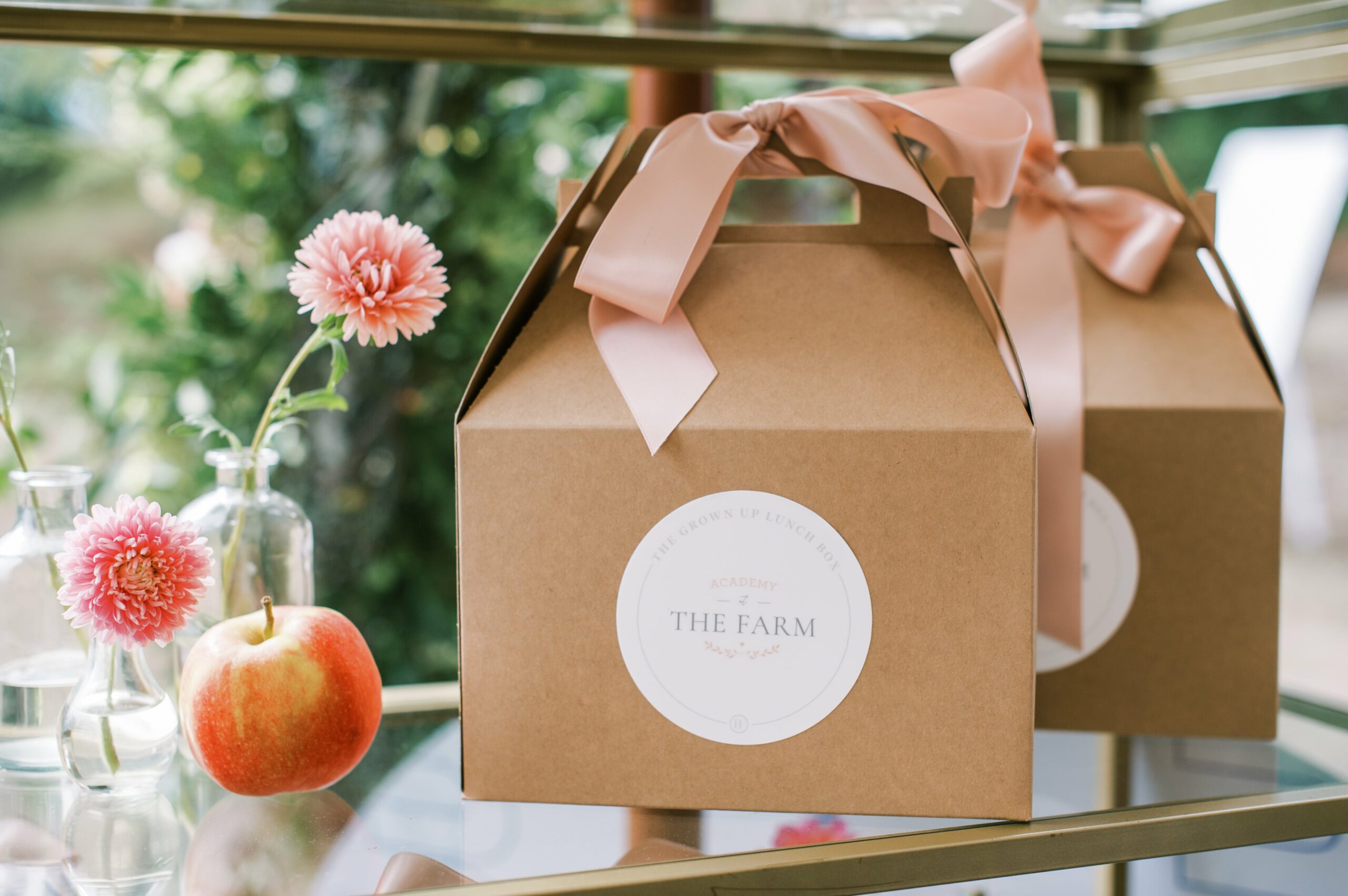 Grown up lunch box in brown gift box with pink ribbon