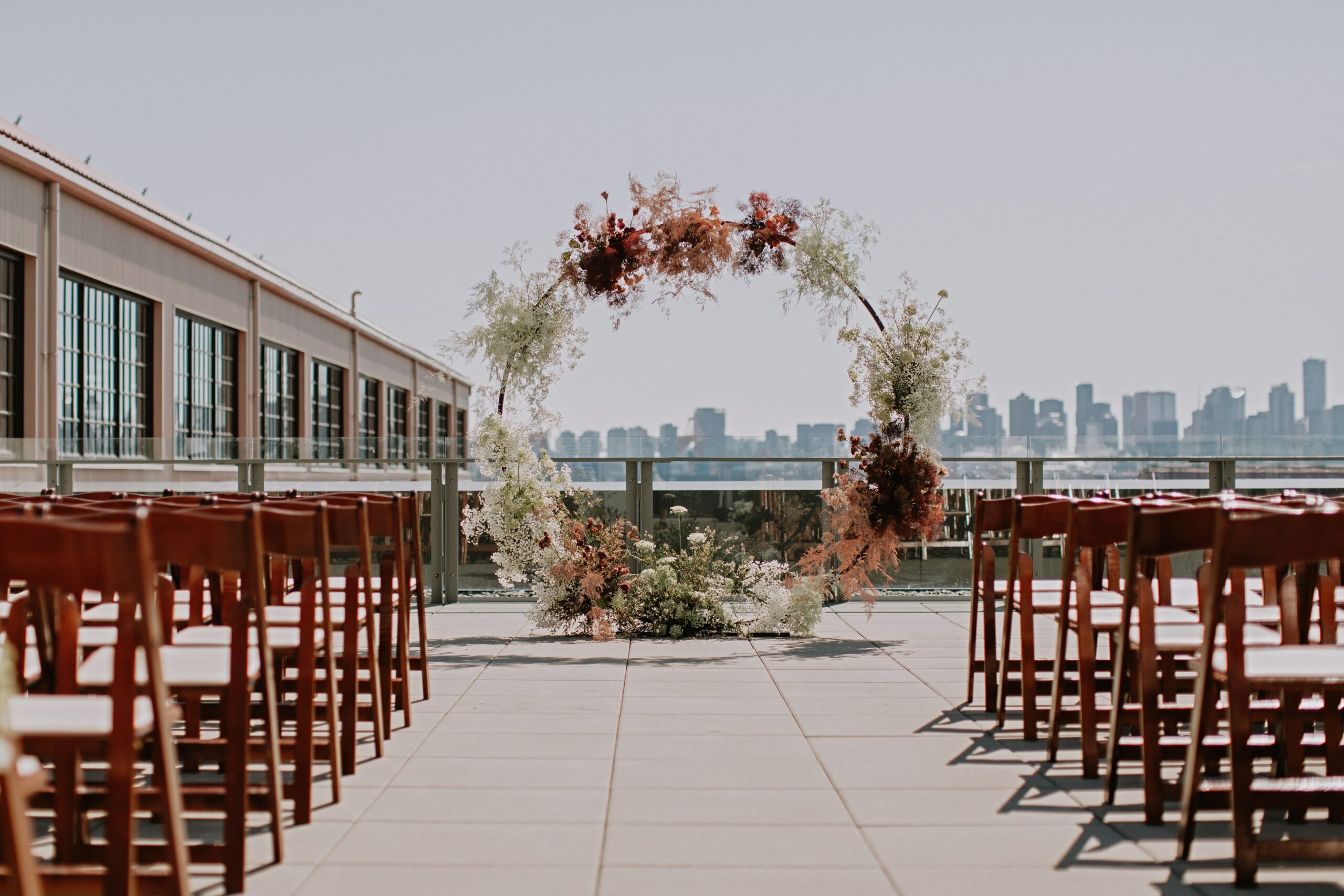 Circle wedding ceremony arch with flowers